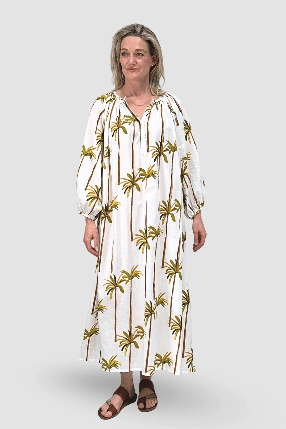Detail of the Golden Oasis Palm Dress palm print and side pocket