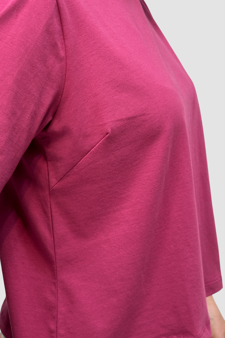 Close-up of a Organic Flex Crew Tee - Berry Sorbet
with darts