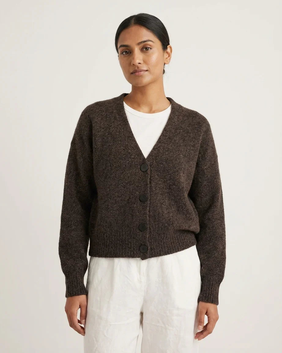 Woman wearing a V-Neck Cardigan - Brown Marl over a white cami on a light background