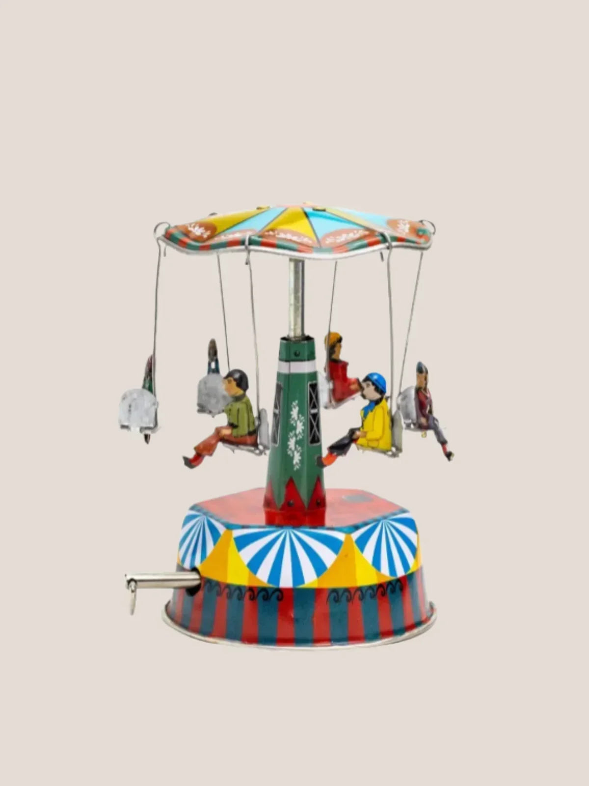 Colorful toy carousel with children on a beige background