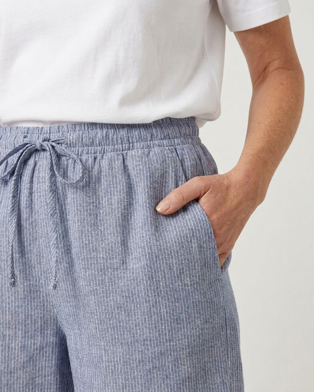 Close-up of the Cove Linen Cotton Pants showing the elasticated waistband, adjustable tie and side pocket