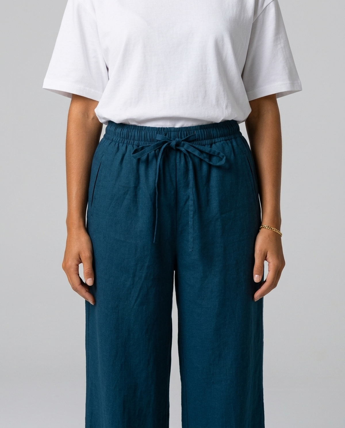 Pillars Blue Wide-leg Pants – front detail showing elasticated waistband, drawstring and pockets