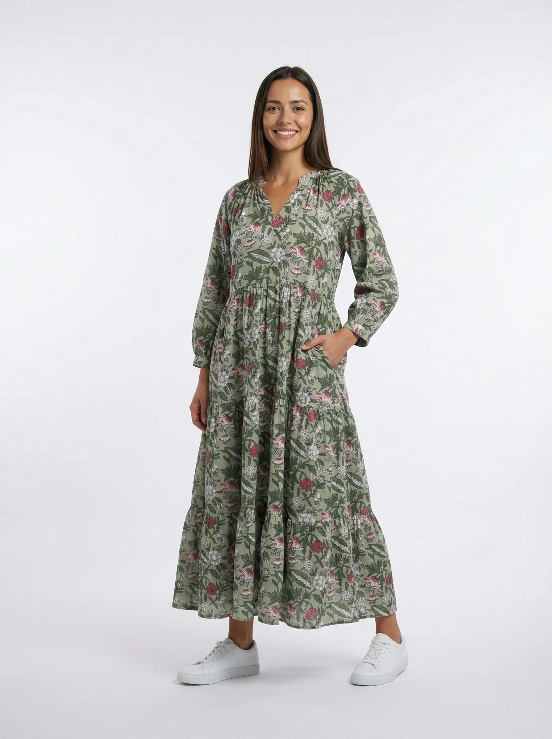 Reca dresses — a woman wearing The Camille Dress in green floral cotton, full length front view
