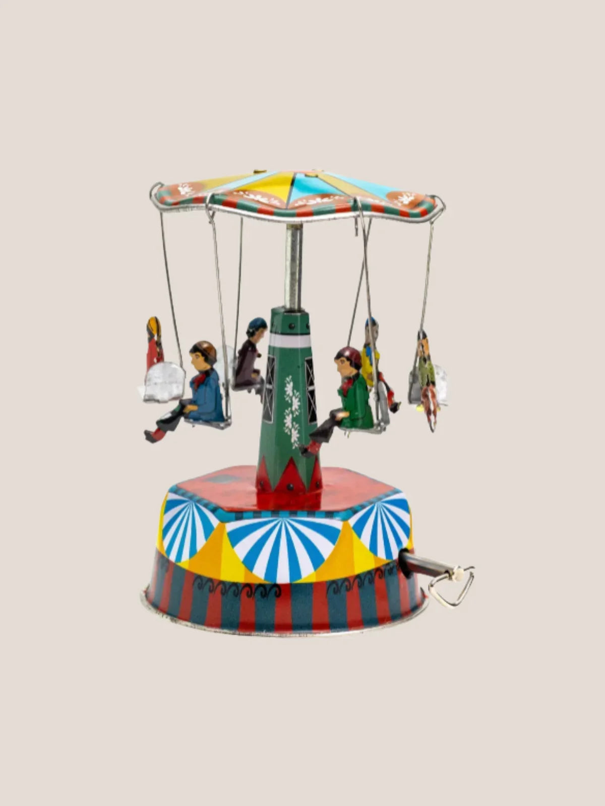 Colorful toy carousel with children on swings against a beige background