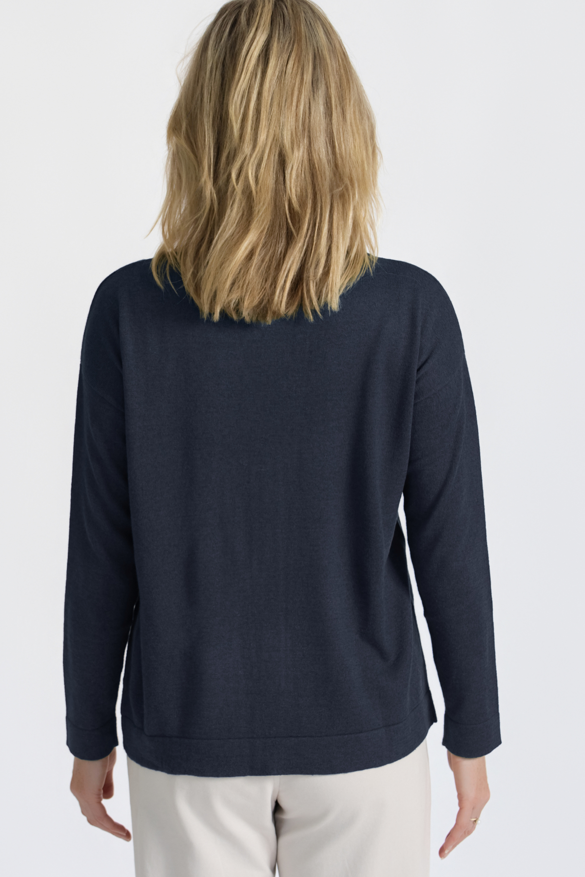 Back view of the Cosmic Blue Silk Cashmere Knit showing the relaxed silhouette and clean back detail