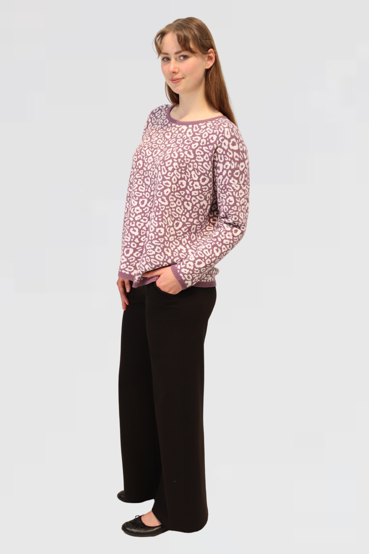Woman showcasing side of Cotton Jacquard Sweater - Mauve s on a white background