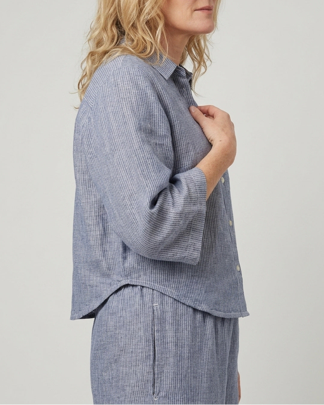 Side view of the Reca Cove Linen Cotton Pants styled with the matching Cove crop shirt