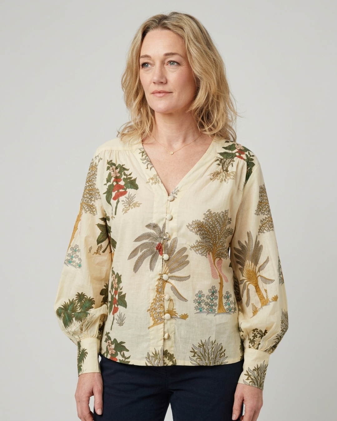 Palm Garden Cotton Blouse front view showing the botanical print and covered buttons