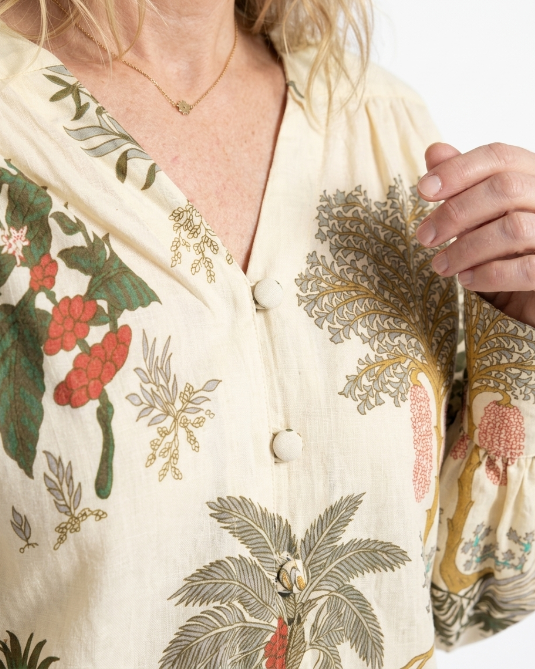 Botanical print and button detail on the Palm Garden Cotton Blouse