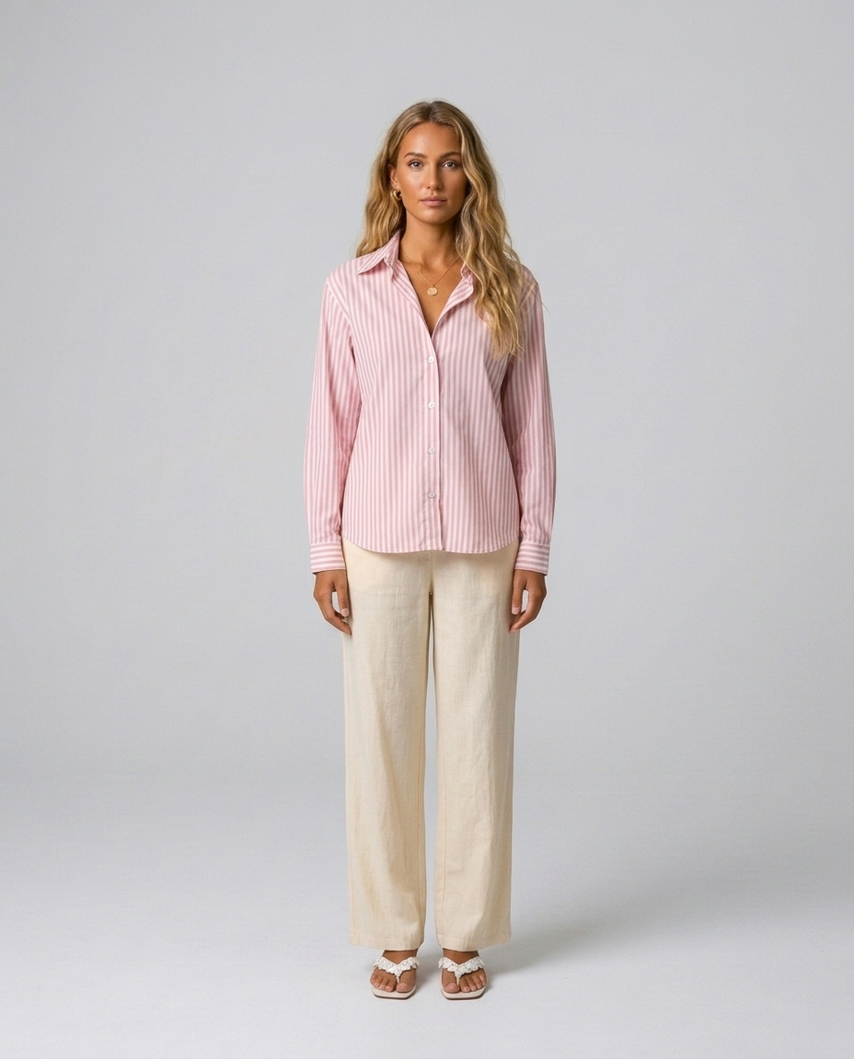 Blush Pinstripe Oversized Shirt in pink and white striped cotton blend, worn by a model