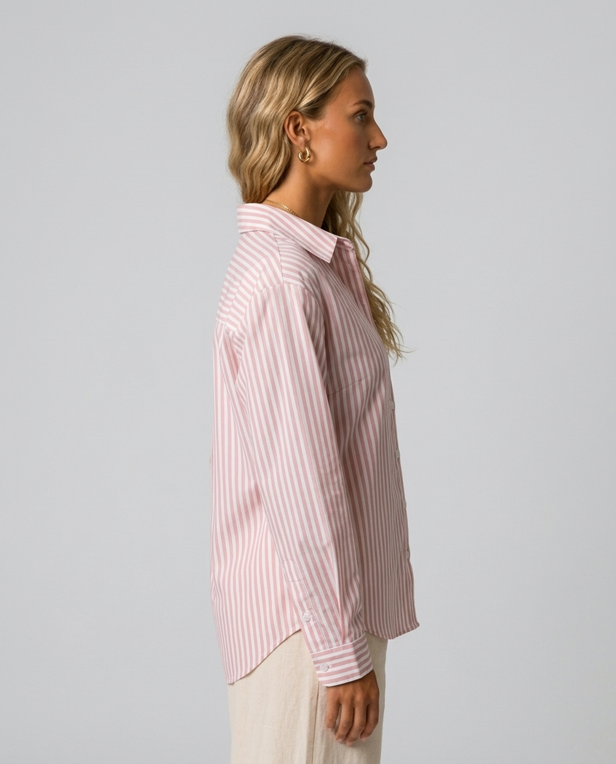 Blush Pinstripe Oversized Shirt in pink and white striped cotton blend, worn by a model