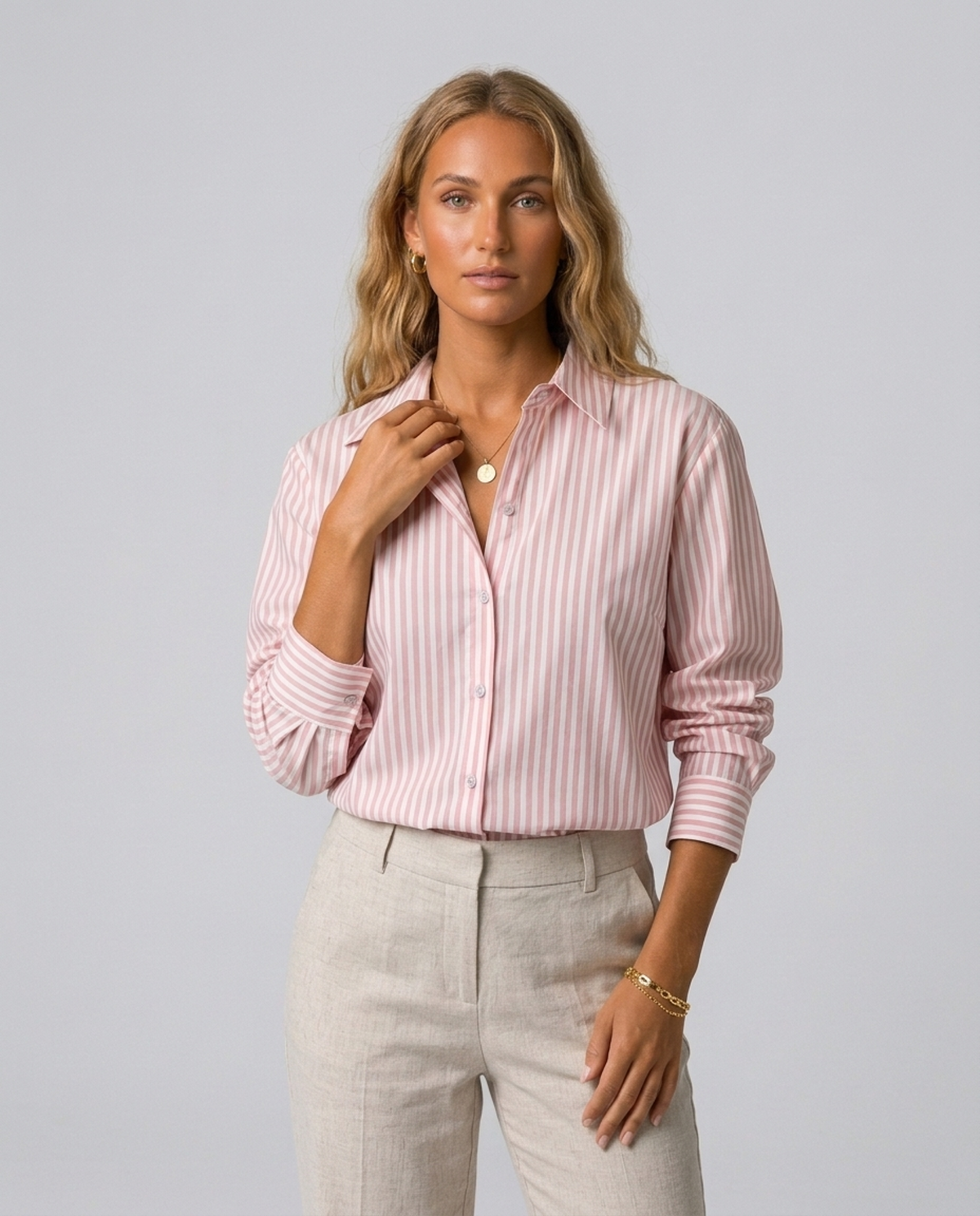 Blush Pinstripe Oversized Shirt in pink and white striped cotton blend, worn by a model