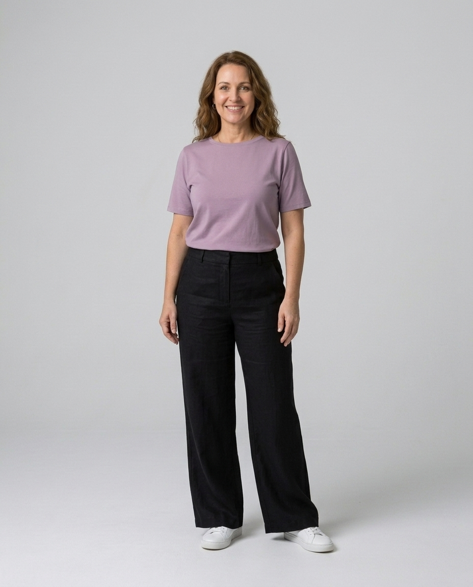 Lavender organic cotton crew tee styled with black trousers, full-length view