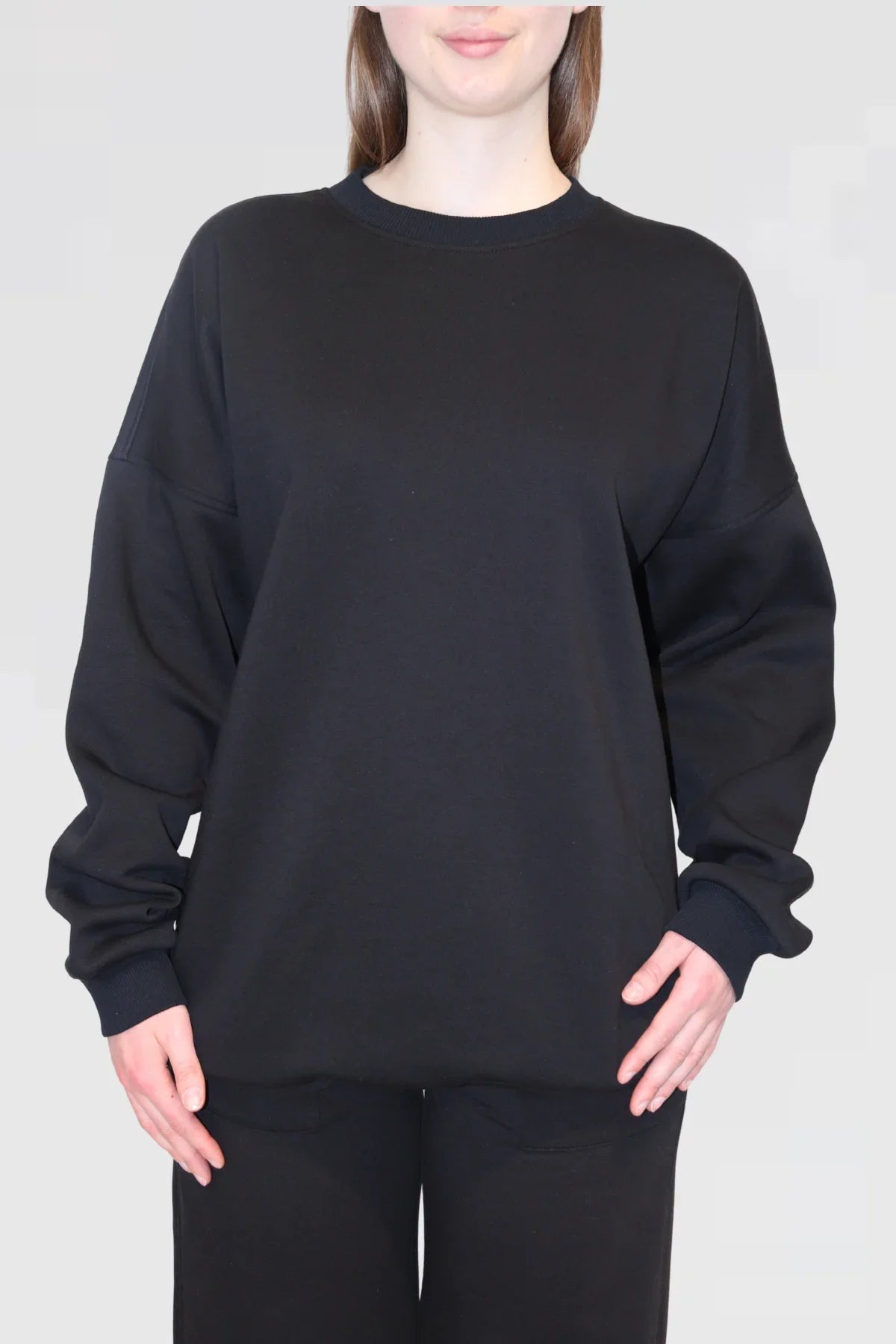 Close-up of Ranch Drop Sleeve Jumper in Black, showing neckline and drop shoulder detail.