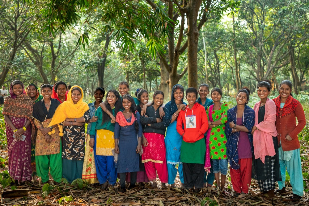 A group of women standing together outdoors